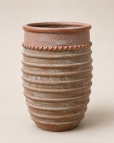 Egg shaped ribbed pot