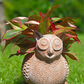 Owl on log planter pot