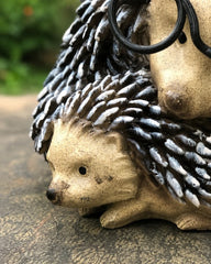 porcupine with baby figurine