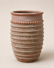 Egg shaped ribbed pot