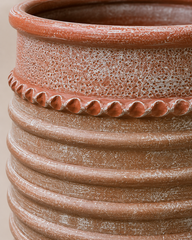 Egg shaped ribbed pot